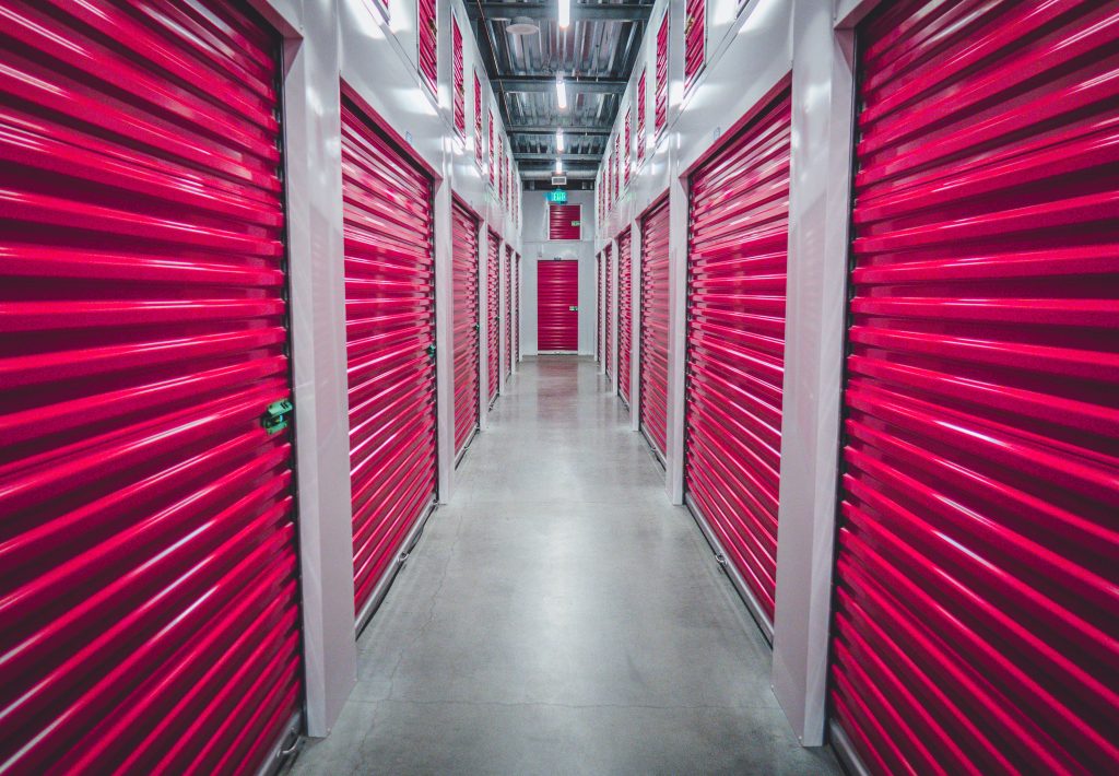 self storage company - a row of self storage units